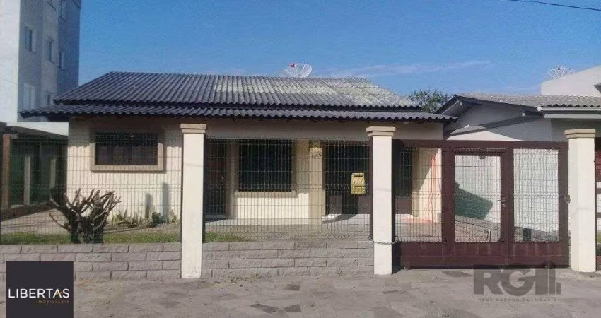 Casa 4 dormitórios à venda Curumim Capão da Canoa/RS