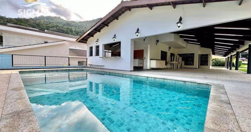 Casa à venda no Condomínio Granville, 480 m² por R$ 2.500.000 - Enseada - Guarujá.