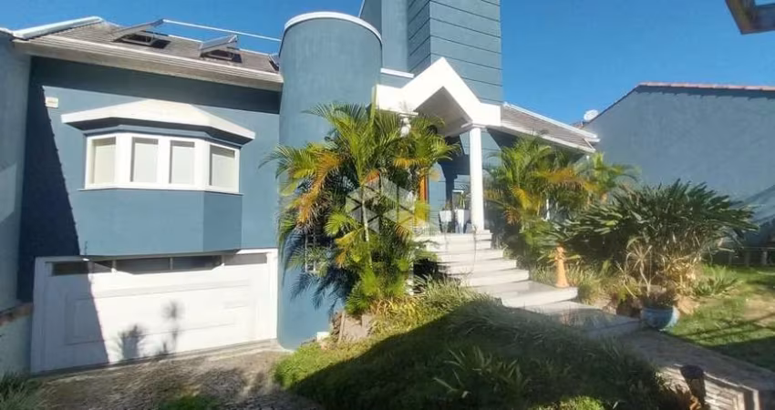 Casa à venda com 3 quartos, 2 vagas no centro de Guaíba com vista panorâmica para o Guaíba