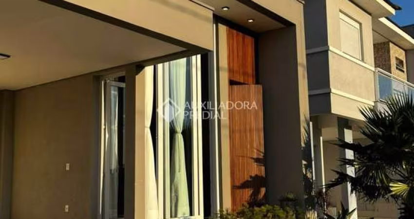 Casa em condomínio fechado com 3 quartos à venda na Avenida Luigi Lucchese, 440, Loteamento Jardim Timbaúva, Gravataí