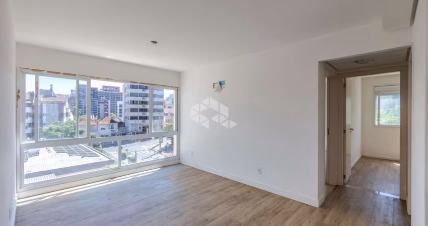 Apartamento com dois quartos e duas vagas, no Rio Branco
