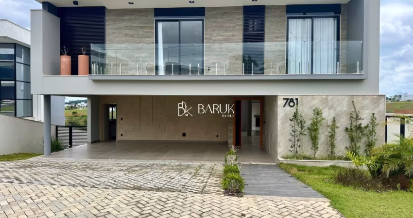 Casa 4 suítes com 420 m2 de área construída no condomínio Alphaville