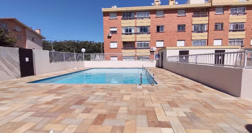 Apartamento em prédio com piscina na praia Capão Novo