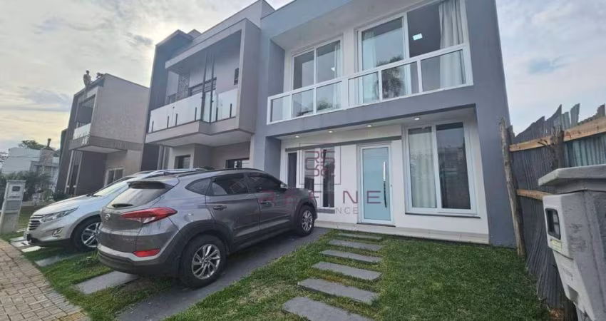 Sobrado com 3 dormitórios à venda, 105 m² por R$ 790.000,00 - Condomínio Primavera - Gravataí/RS