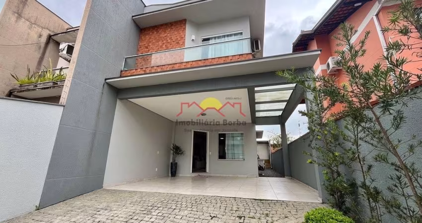 12167- Sobrado Geminado Mobiliado com 03 Vagas de Garagem no bairro Iririú