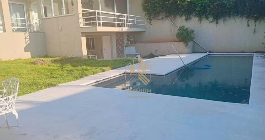 Casa com 3 dormitórios, 420 m² - venda por R$ 2.400.000,00 ou aluguel por R$ 16.000,00/mês - Condomínio Arco Iris - Atibaia/SP