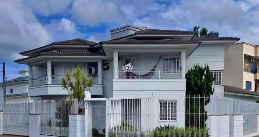 Casa para Venda em Sombrio, Centro, 4 dormitórios, 1 suíte, 2 banheiros, 2 vagas