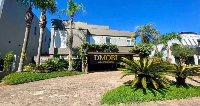Sobrado com 3 dormitórios para alugar, 393 m² por R$ 25.428,52/mês - Alphaville - Gravataí/RS