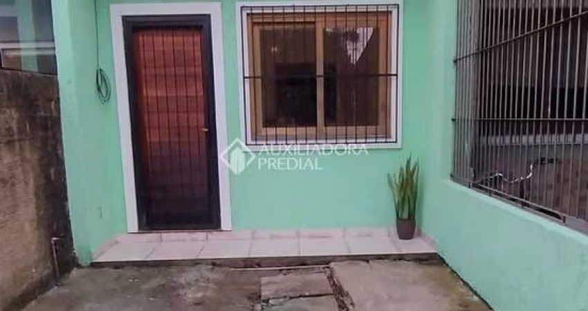 Casa com 2 quartos para alugar na Rua Pedro Cláudio Monassa, 1031, Jardim Algarve, Alvorada