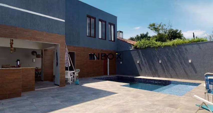 Casa com 4 quartos à venda na Rua Jacundá, 132, Guarujá, Porto Alegre